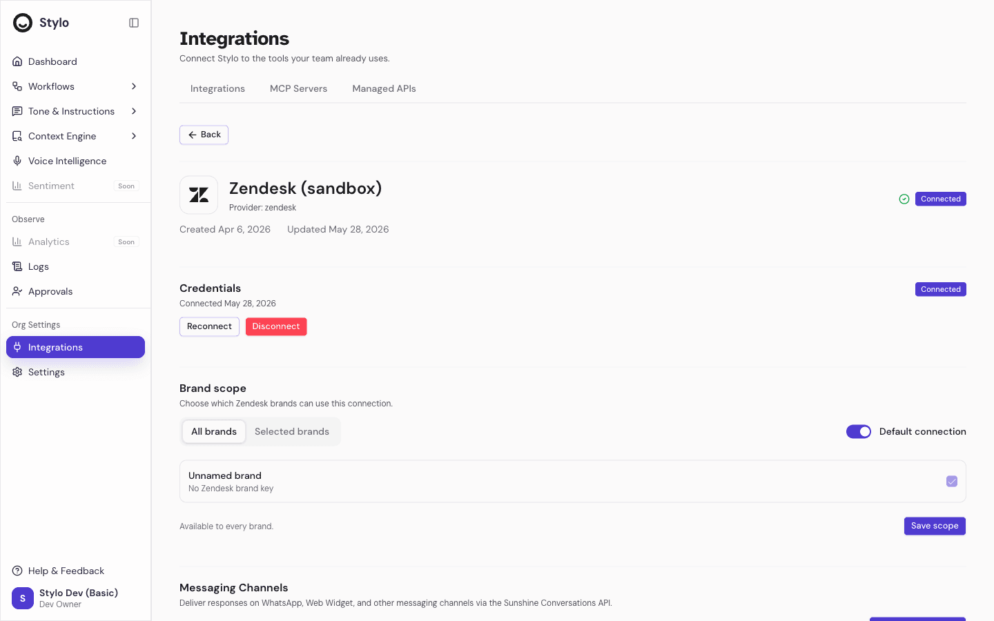 Zendesk integration detail page showing a green Connected status badge, the credentials section with Reconnect and Disconnect actions, and the brand scope settings